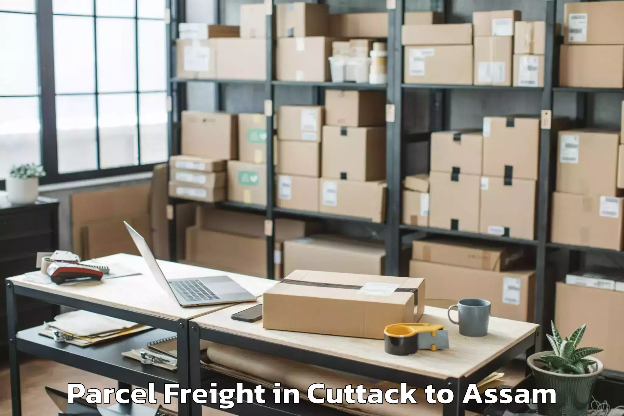 Book Cuttack to Rajapara Khatajuli Parcel Freight